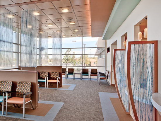 Waiting room for dental clinic with views to the exterior.